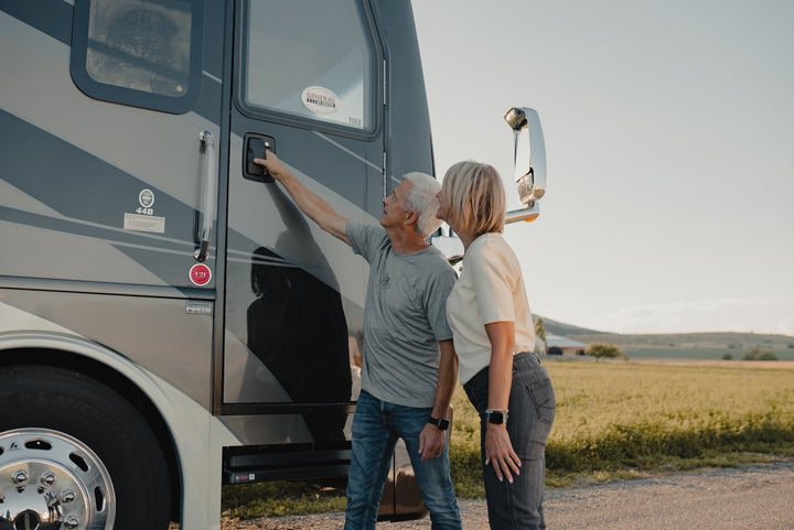 Couple looking at an RV